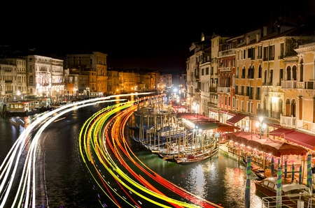 famous grand canale from Rialto Bridge at night with light trails, Venice, Italyの写真素材