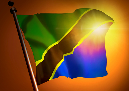 winner waving Tanzania flag against the sunsetの写真素材