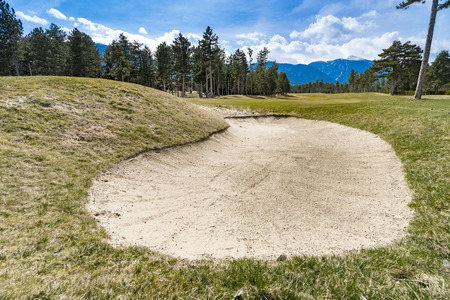 Sand bunker on the beautiful golf courseの写真素材