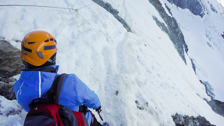 Hikers at hiking expedition at Couloir stage toward Mont Blanc n Alps mountains in France.の写真素材