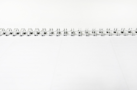 paper notebook with spiral background, selective focus dofの写真素材