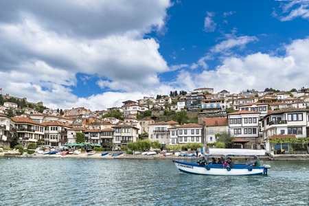 Ohrid, Macedonia - circa Jun, 2017: Tourists on Boat tour cruise on Ohrid lake in a beautiful summer cloudy dayのeditorial素材