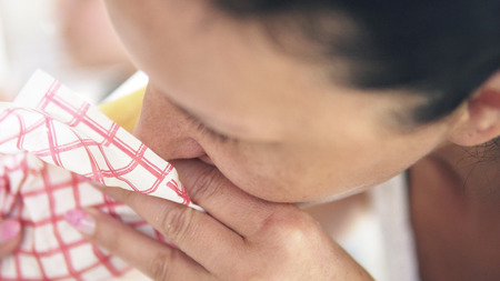 Woman bite into a delicious Shawarma doner sandwichの写真素材