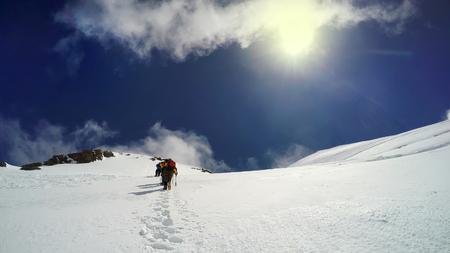 Alpinists pov climbing at Alps mountain, Mont Blanc during sunny dayの写真素材