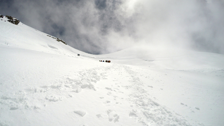 mountaineers go over the mountain in French Alpsの写真素材