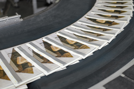 Close up of an offset printing machine during productionの写真素材