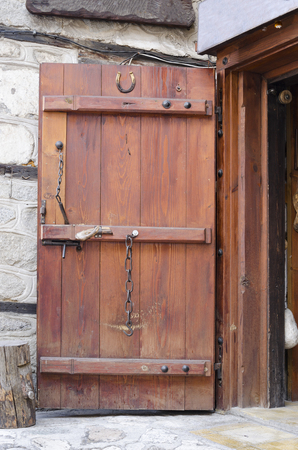 Open entrance  brown wood old doorの写真素材