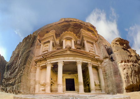 Low angle panoramic view of the facade of the Treasury building in the ancient Nabatean ruins of Petra, Jordanの写真素材