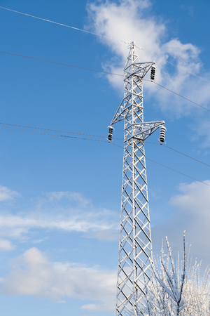 transmission line in winter snow, verticalの写真素材