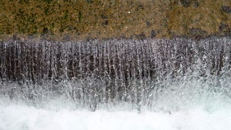 Industrial water drain small waterfall, closeupの写真素材