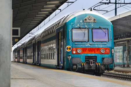 Trenitalia Regional Train Vivalto Stop in the Station. The Train Has Two Levels for the Passengeの写真素材