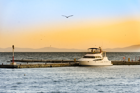 Luxury yacht  on port at sunset in Nesebar, Bulgariaの写真素材
