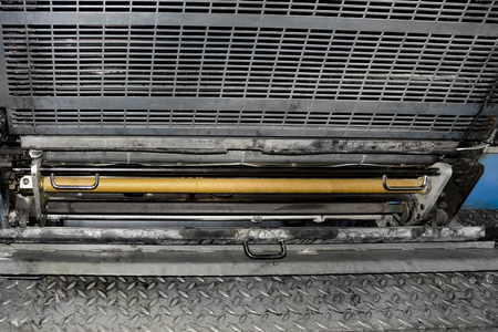 Close-up of soiled paint printing machineの写真素材