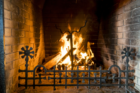 Close up shot of burning firewood in the fireplaceの写真素材