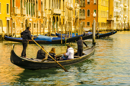 Venice, Italy - 15 Mar, 2015: Canal with two gondolas in Venice, Italy. Architecture and landmarks of Veniceのeditorial素材