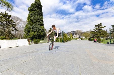 Skopje, Macedonia - circa Apr, 2013: Bmx freestyle. A man on bmx doing tricks outdoorのeditorial素材