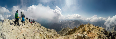 Panoramic view of Mountaineer expedition climbing to rocky mountain summit Triglav on Julian Alps mountain rangeのeditorial素材