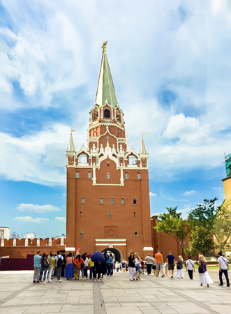 Moscow, Russia - 06 August, 2016: People walking through entrance, Spasskaya Tower of Moscow Kremlin near Grand Kremlin Concert Hall in Moscow Russia in winterのeditorial素材