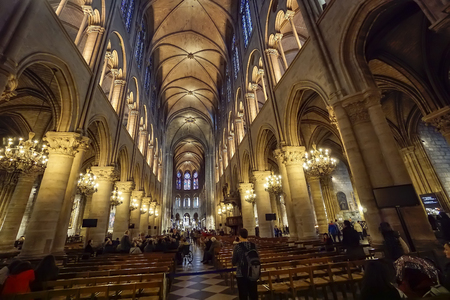 Interior of the Notre Dame in Paris. The cathedral of Notre Dame is one of the top tourist destinations in Parisのeditorial素材