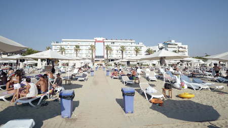 Touris walk pov on beach seafront resort on famous beach in Gloem in Durres, Albaniaのeditorial素材
