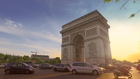 Arch Of Triumph And Champs Elysees Traffic Motion at Sunsetのeditorial素材