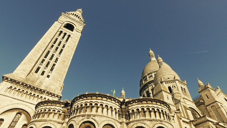 Outdoor facade of Basilica of Sacre-Coeur in Montmartre, Paris, France, cinematic steadicam view