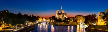 Panorama of The Cathedral of Notre Dame de Paris, France at sunsetの写真素材