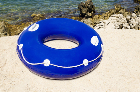 Inflatable ring in water, concept of the summer timer