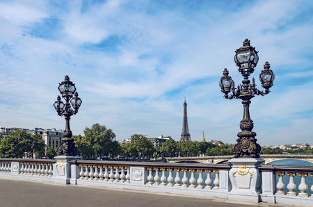Eiffel Tower and Bridge Alexandre III latterns over Seine River, a postcard of Paris, Franceの写真素材