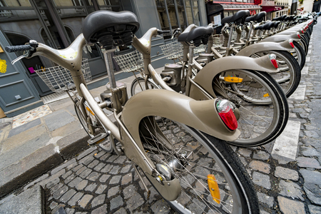 Row of city bikes for rent in Paris, Franceの写真素材