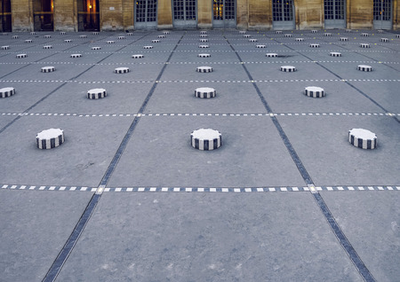 Paris, France - circa May, 2017: France, Paris, Palais Royal (Royal Palace) Daniel Buren's work of...