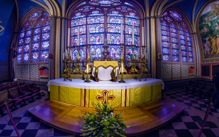 Paris, France - 06 May, 2017: Panorama of interior of the Notre Dame de Paris with stained glass windows. The cathedral of Notre Dame is one of the top tourist destinations in Parisのeditorial素材