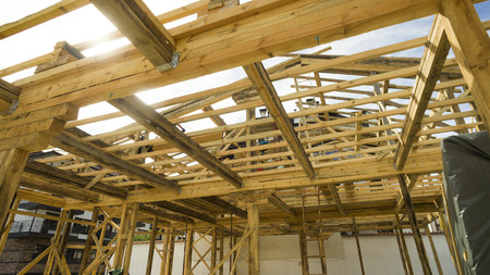 Interior framing of a new house frame under constructionの写真素材