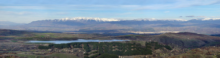 Panorama of mountain landscape and mountain lake in a beautiful dayの写真素材