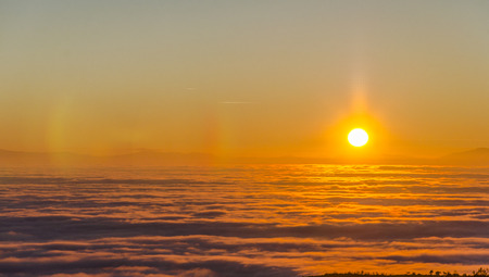 Big sun and Mist in sunrise, sunset on mountian morning, aerialの写真素材