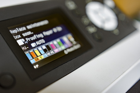 Digital print machine, Ink jet Printing print cartridges level dispolay information. Dof copyspace backgroundの写真素材