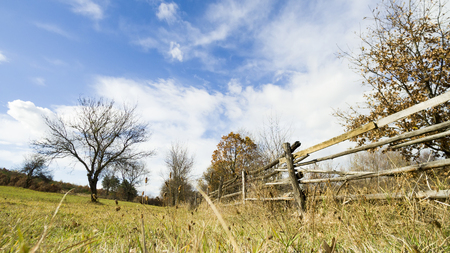 Fence in a field in a rural areaの写真素材