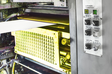 offset machine press print run at tableの写真素材