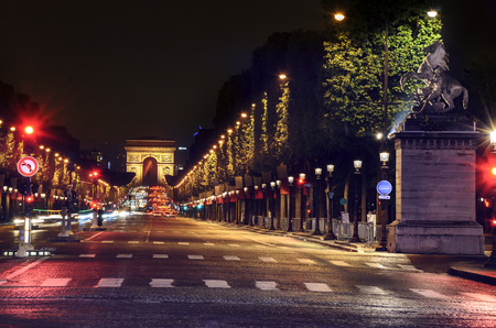 Avenue des Champs Elysees and Arc de Triomphe at night, Parisの写真素材