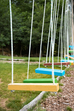 Rope adventure park in a summer forest scenicの写真素材