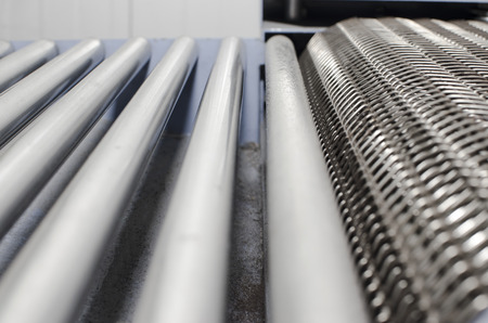 Industrial machine.convey-er belt. rotating track. industrial technology, selective focusの写真素材