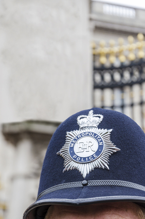 London Police Hat Badge, closeup verticalのeditorial素材