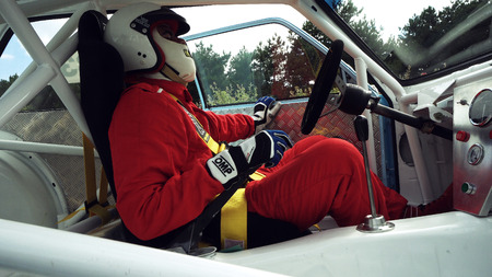 Kocani, Macedonia - 24 Jun, 2018: Sport driver wearing protective helmet prepare to start hillclimb...