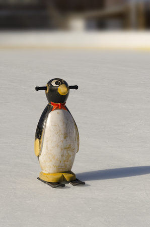 Penguin figure used to help the beginners in ice skating leasonsの写真素材