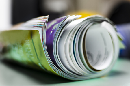 Newspapers folded and stackedの写真素材