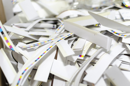 CMYK color bars on printed sheets of paperの写真素材