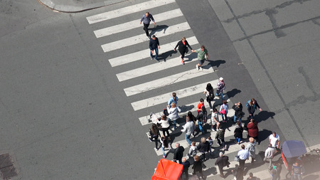 Paris, France - circa May, 2017: Aerial view of pedestrian crossing on street in Paris next to Eiffel Towerのeditorial素材