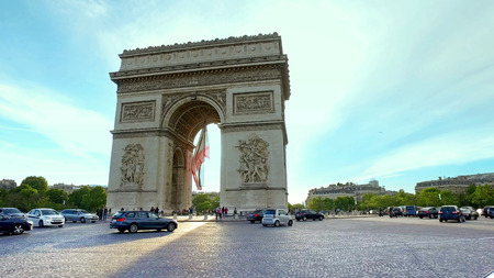 Paris, France - circa May, 2017: Traffic around the famous Arc du triomphe. Police block the way fro security reason, hyperlapse cinematic viewのeditorial素材