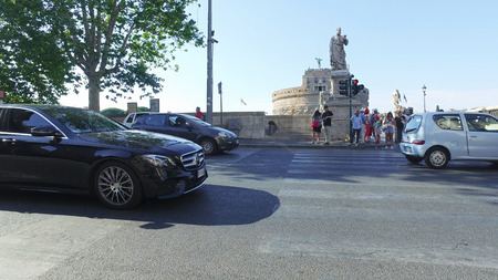 Rome, Italy - 16 June, 2017: Traffic at street near the Castel Sant Angelo or Mausoleum of Hadrian in Rome Italyのeditorial素材