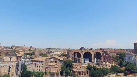 Roman Forum view in Rome, inside the site with tourists and the archeological ruins of ancient Romeの写真素材
